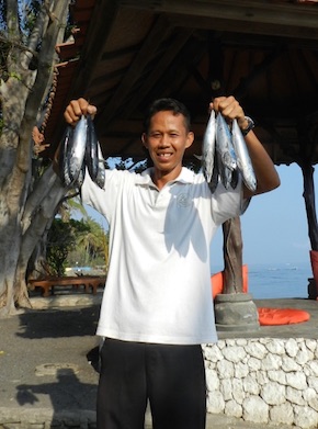 Putu and fresh fish - Bali Mandala